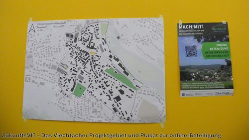 eine Karte und ein Buch auf einer gelben Fläche